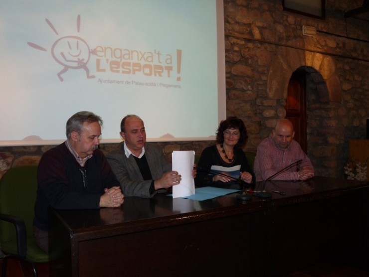 Albert Font, David Godayol, Mercè Pla i Josep Costajussà en la signatura del conveni