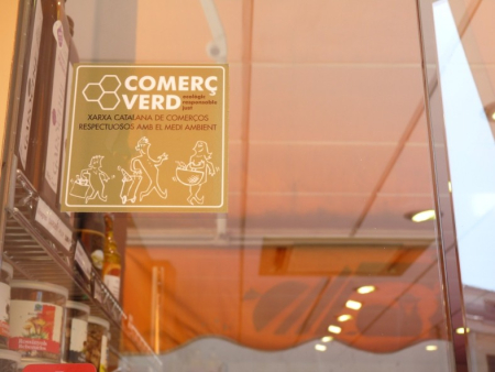 Etiqueta que identifica els comerços adherits a la Xarxa Comerç Verd