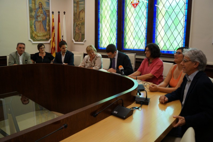 El conseller de Justícia, Carles Mundó, a l'Ajuntament de Palau-solità i Plegamans.